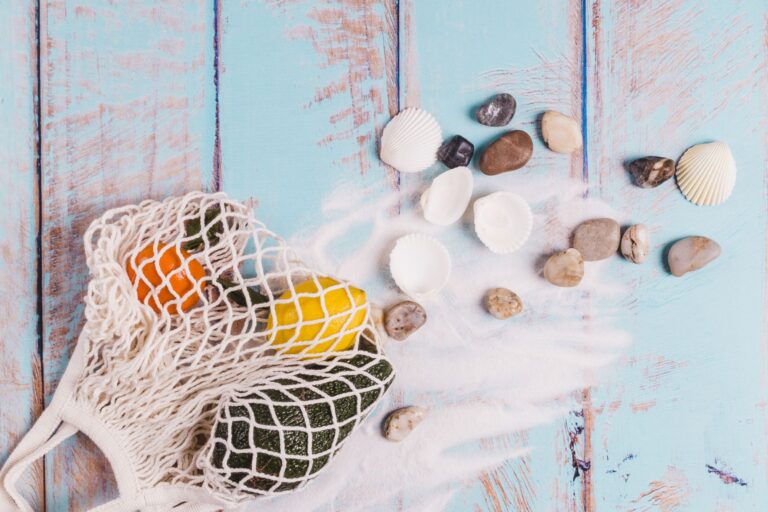 shells-stones-sand-fruits-wooden-board_result